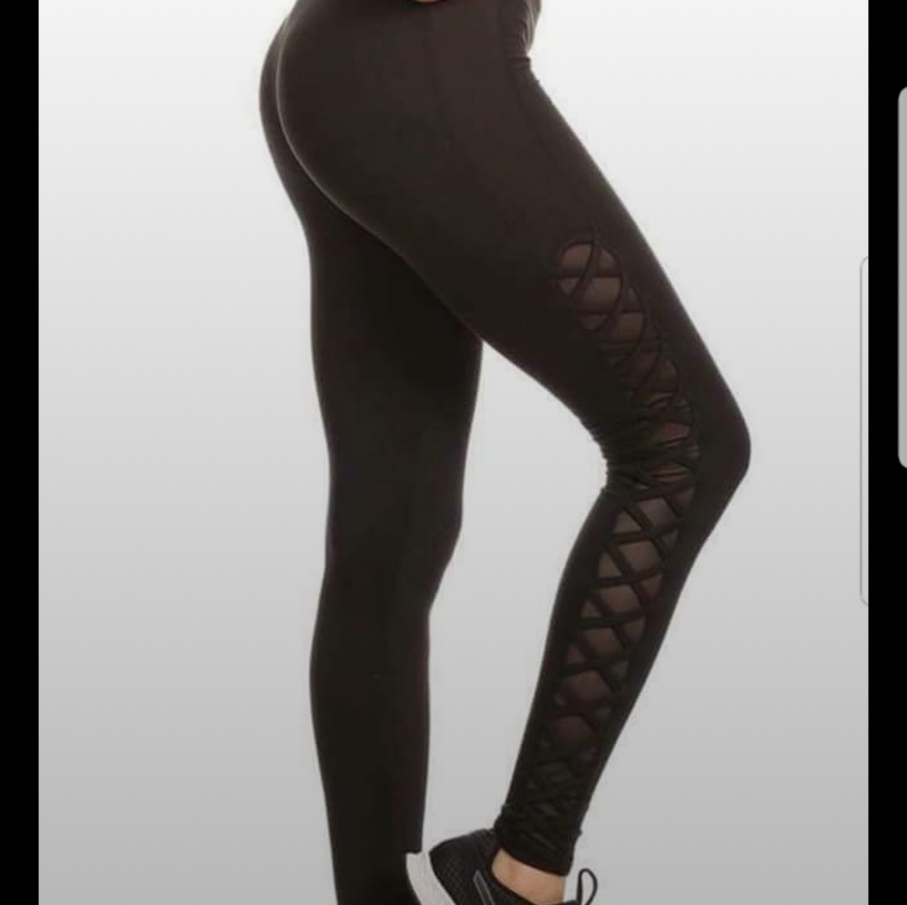 Black crisscross side leggings by Shosho